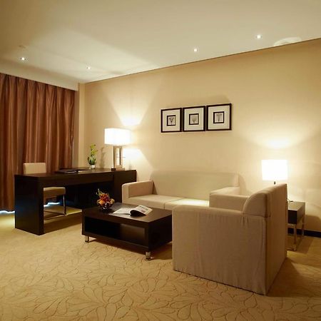 Swiss-Belhotel Liyuan Уси Екстериор снимка