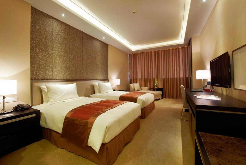 Swiss-Belhotel Liyuan Уси Екстериор снимка