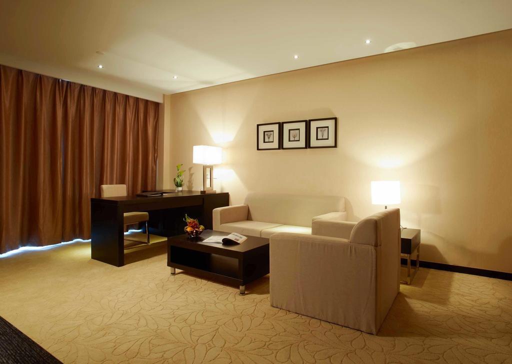 Swiss-Belhotel Liyuan Уси Екстериор снимка