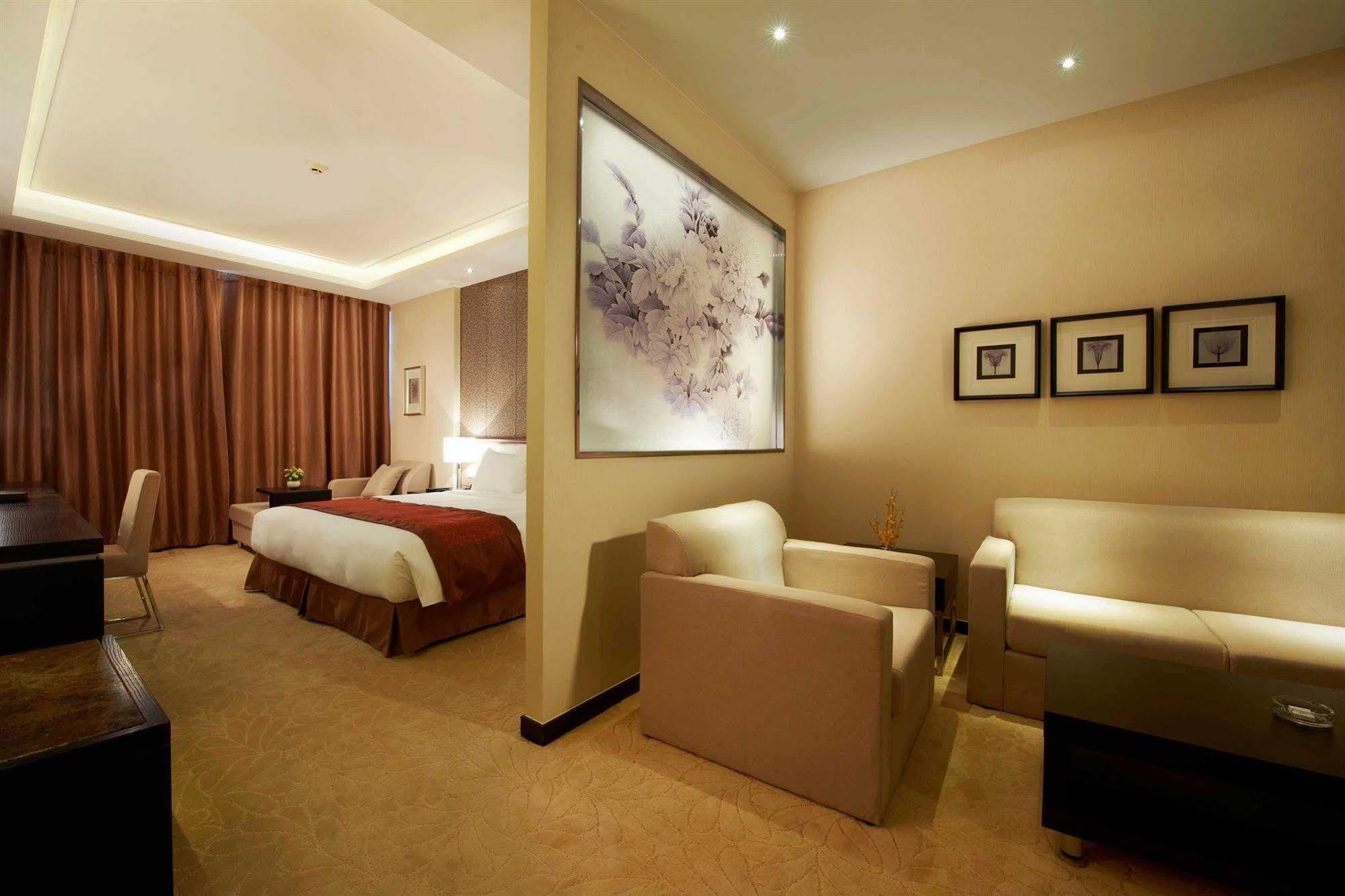 Swiss-Belhotel Liyuan Уси Екстериор снимка