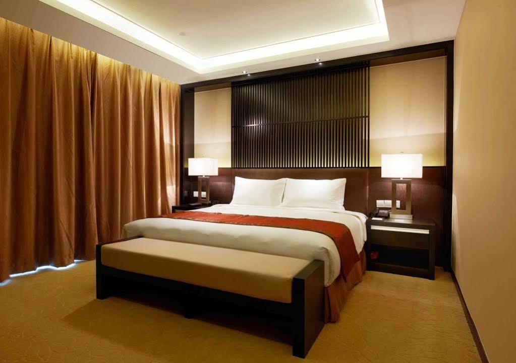 Swiss-Belhotel Liyuan Уси Екстериор снимка